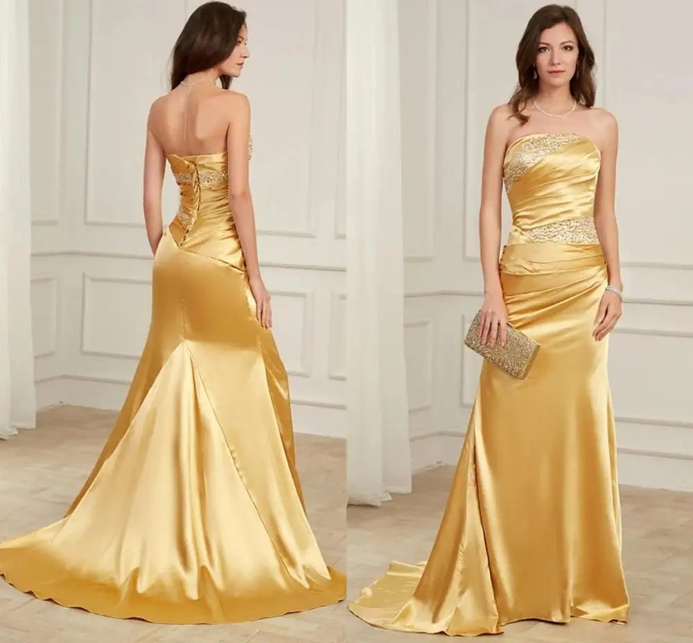 Robe de soirée élégante en satin doré à manches longues et perles